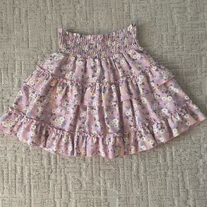 Purple ruffle skirt with flower print